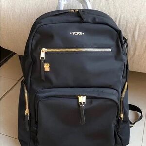 Tumi Black Backpack with Gold Hardware